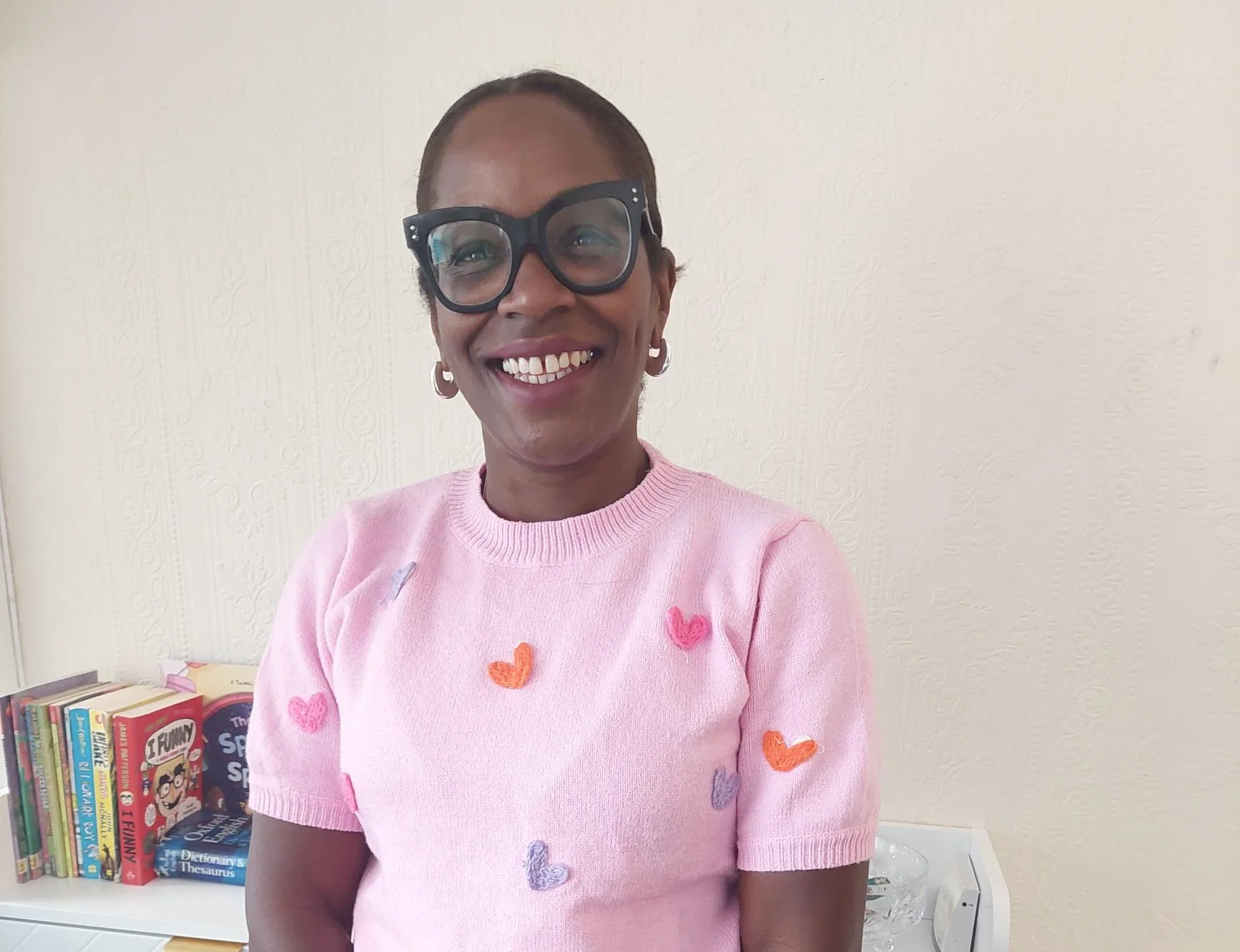 Michelle, a Camden foster carer, smiling at the camera.